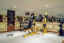 Mirrors make this exercise room feel very large in this finished basement in Plymouth Meeting, PA.